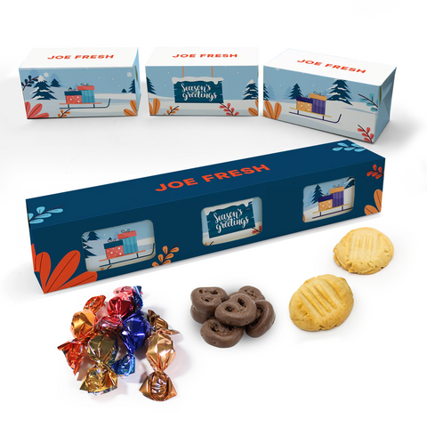 Holiday gift box with cookies, chocolate pretzels, and wrapped chocolate truffles on a white background